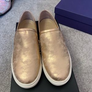 Lord & Taylor rose gold slip ons.
